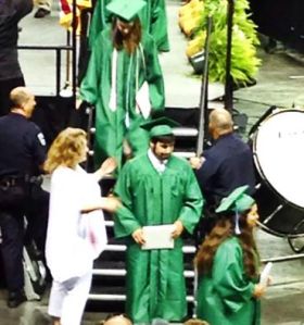 Eitan gets that important piece o' paper!